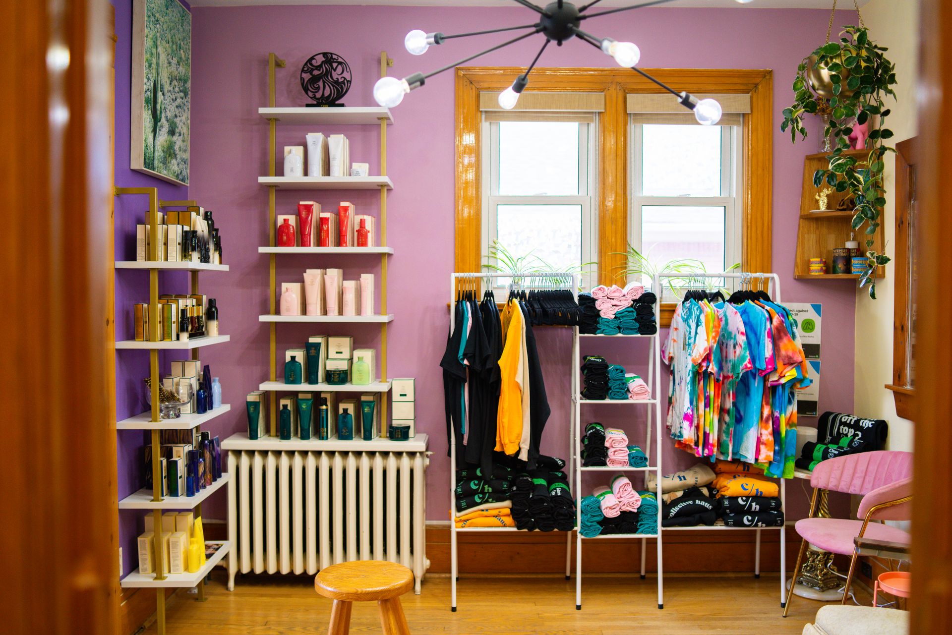 Products and merchandise displayed in salon area of Collective Haus.