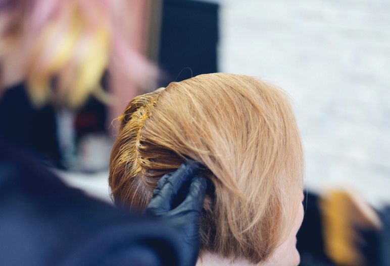 Emma Quinn, owner of Collective Haus, applying colour to client’s hair