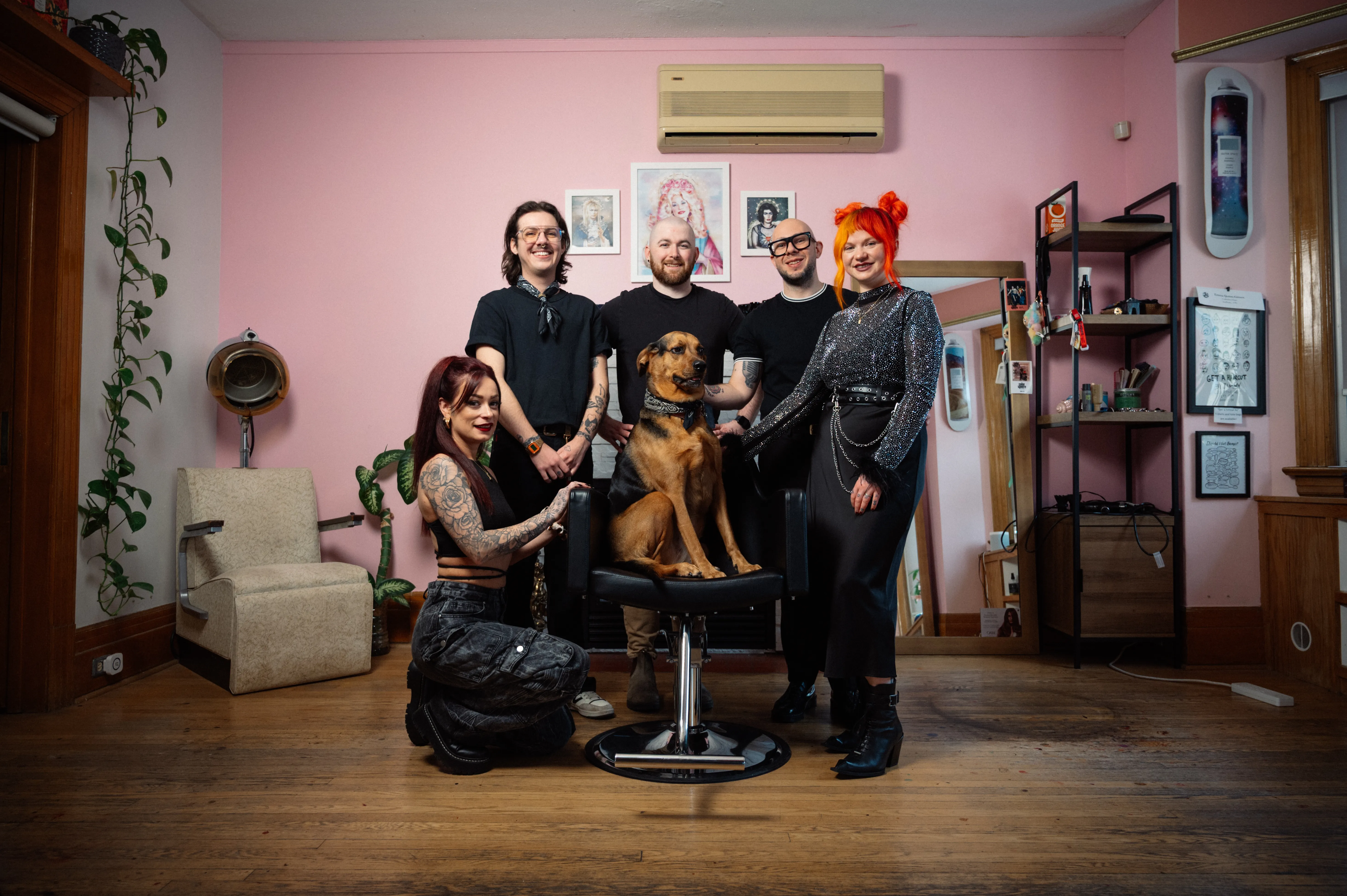 The Collective Haus crew of barbers and stylists hanging out in the barbershop.